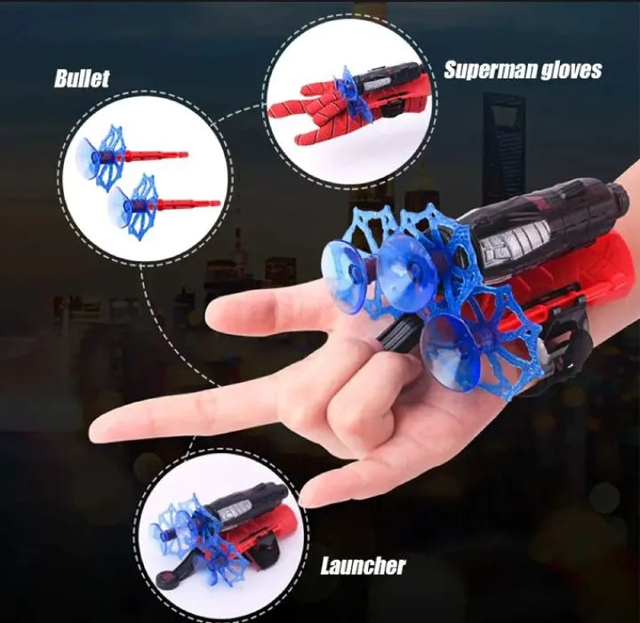 Toy glove with launcher, bullets, and Superman gloves on a dark background