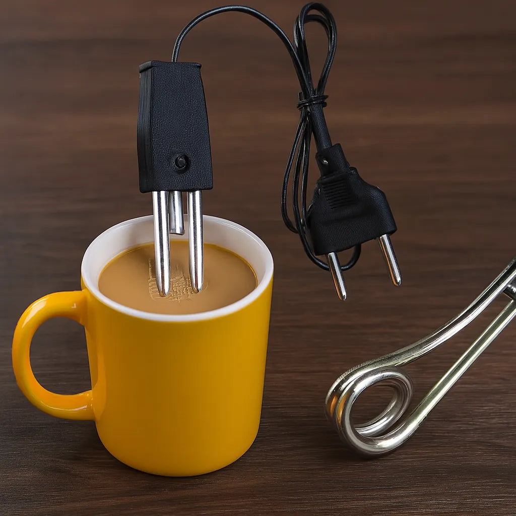 An electric coffee maker insert with a black power cord and metal heating element shown next to a yellow mug filled with coffee on a dark wooden surface.