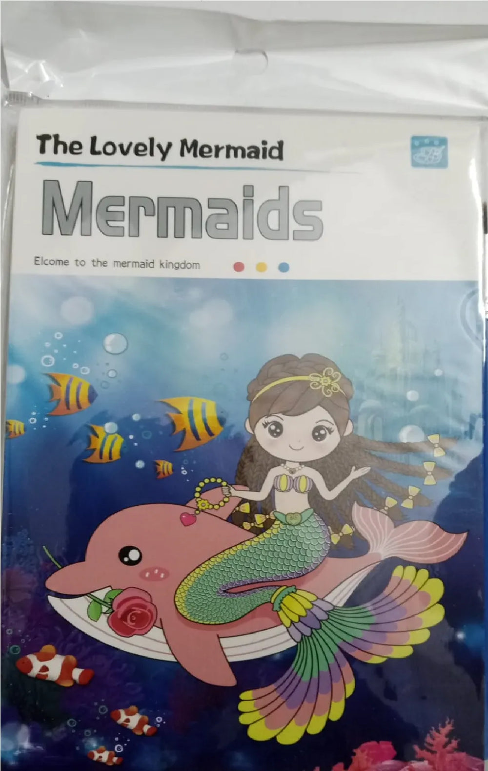 A packaged children's book or booklet titled "The Lovely Mermaid Mermaids" with colorful underwater artwork showing a mermaid riding a pink dolphin, surrounded by fish and bubbles.