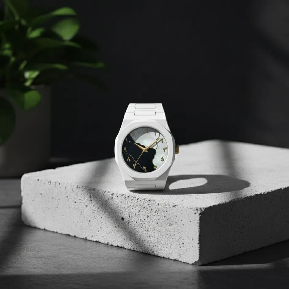 White watch with black face on a concrete block with a dark background