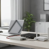 Technological devices on a desk with a laptop in a blurred office setting